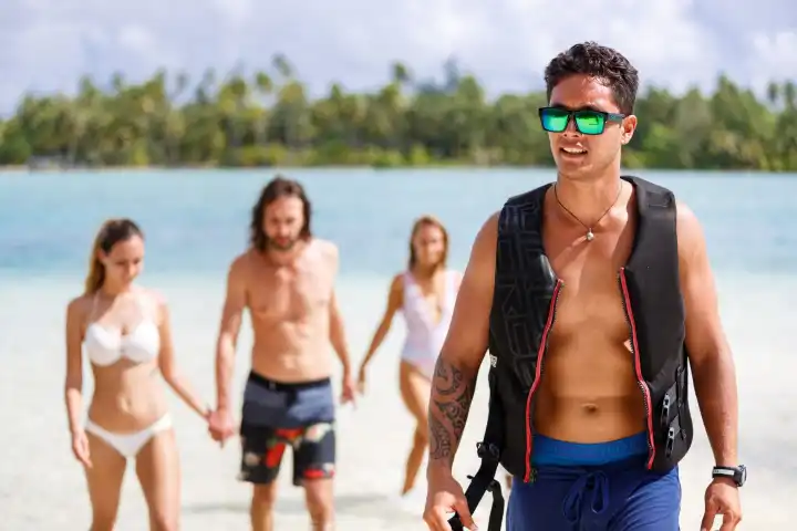 A group of people having a break during a jet ski tour in Bora Bora