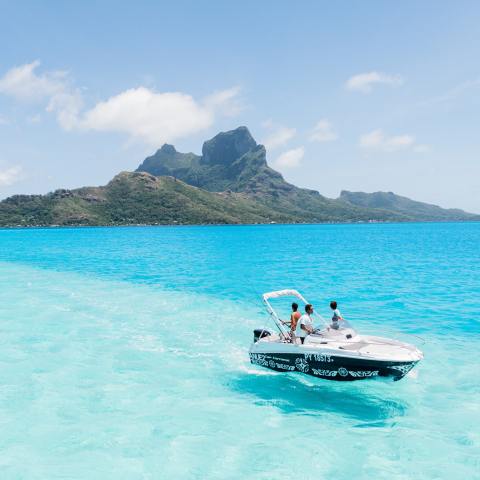A couple fishing in Bora Bora lagoon