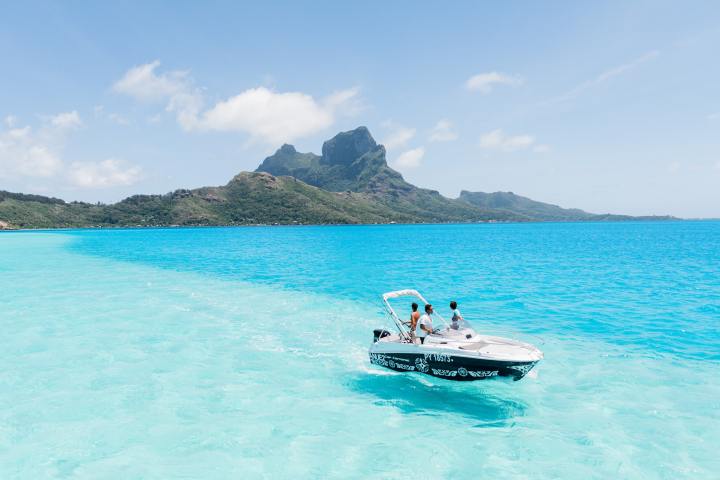 A couple fishing in Bora Bora lagoon