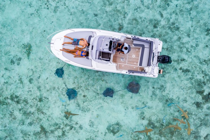 A couple enjoying a private boat tour in Bora Bora