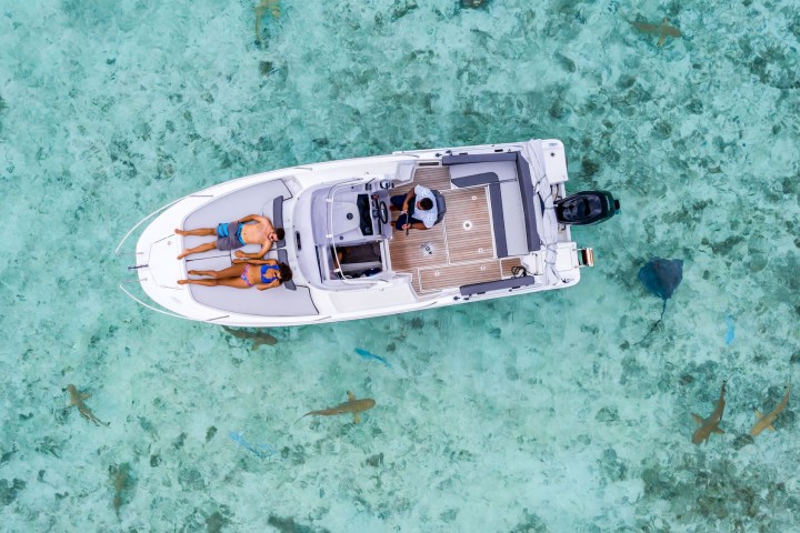 A couple enjoying a private boat tour in Bora Bora