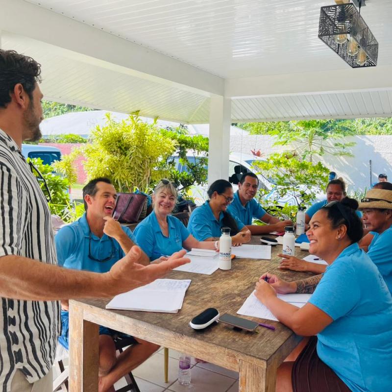 Annabel Palma et al. sitting at a table