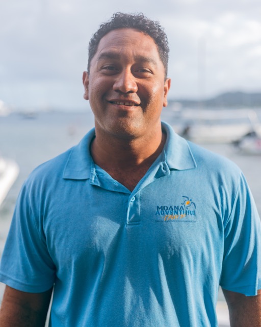 a man wearing a blue shirt