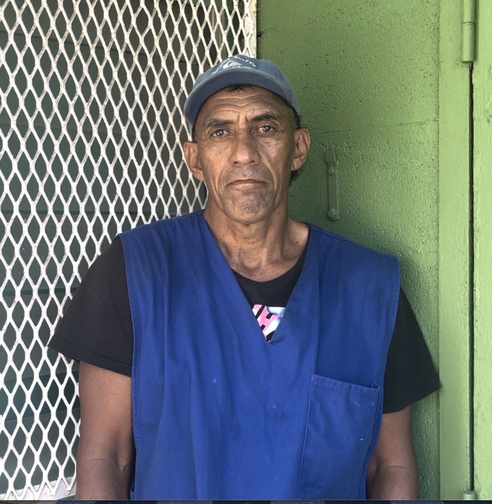 a man in a blue shirt