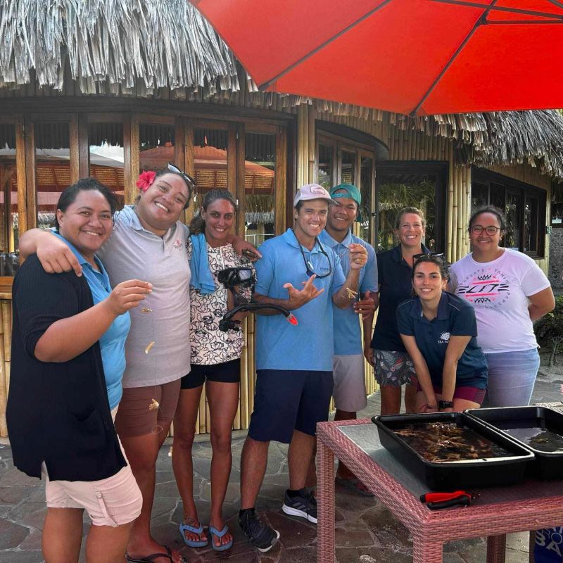 a group of people standing in front of a building
